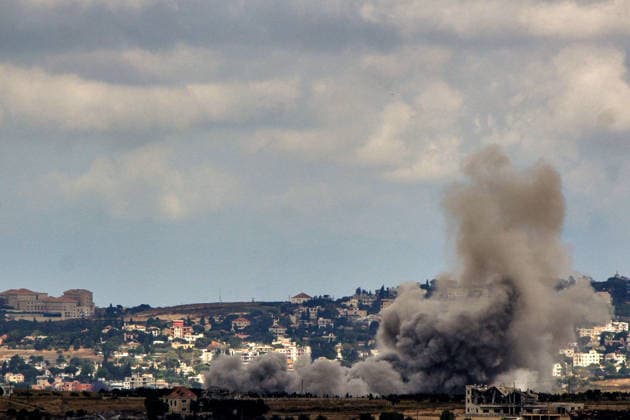 June 14, 2026, Kfar Tebniet, Kfar Tebniet, Lebanon: Smoke billows from Israeli air strikes from the southern Lebanese village of Kfar Tebniet on the outskirts of the major city of Nabatieh. The Israeli army issued warning to evacuate 29 villages and towns in southern Lebanon as it continued its ground advance making the deepest incursion into Lebanese territory in over a quarter of a century. Troops have established a presence on the suburbs of Nabatieh after seizing several strategic points. Kfar Tebniet Lebanon - ZUMAn313 20260614_zip_n313_003 Copyright: xMarwanxNaamanix