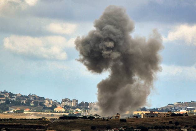June 14, 2026, Kfar Tebniet, Kfar Tebniet, Lebanon: Smoke billows from Israeli air strikes from the southern Lebanese village of Kfar Tebniet on the outskirts of the major city of Nabatieh. The Israeli army issued warning to evacuate 29 villages and towns in southern Lebanon as it continued its ground advance making the deepest incursion into Lebanese territory in over a quarter of a century. Troops have established a presence on the suburbs of Nabatieh after seizing several strategic points. Kfar Tebniet Lebanon - ZUMAn313 20260614_zip_n313_004 Copyright: xMarwanxNaamanix