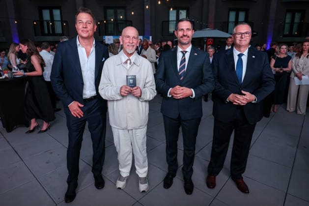 John Malkovich visited the Croatian national football team Famous Hollywood actor John Malkovich visited the Croatian national football team at their American base in Alexandria (USA) ahead of the opening of the 2026 World Cup. After hanging out with coach Zlatko DaliÄ‡ and Luka ModriÄ‡ and his teammates, John was ceremonially presented with a Croatian passport on June 14, 2026 in Alexandria (USA)  IgorxKralj PIXSELL