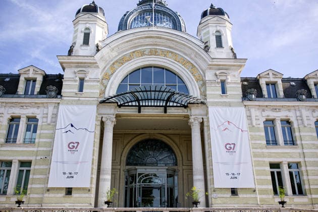 June 13, 2026, °Vian-Les-Bains, Haute-Savoie, France: EVIAN-LES-BAINS, FRANCE - JUNE 14, 2026: G7 summit promotional banners hang on the facade of the historic Palais LumioÂ¨re in Evian-les-Bains, France, June 14, 2026, ahead of the upcoming international summit scheduled for June 15-17. Security measures and logistical preparations have intensified across the lakeside town as it prepares to host world leaders for the annual Group of Seven conference °Vian-Les-Bains France - ZUMAc267 20260613_zip_c267_011 Copyright: xMarcoxCordonex