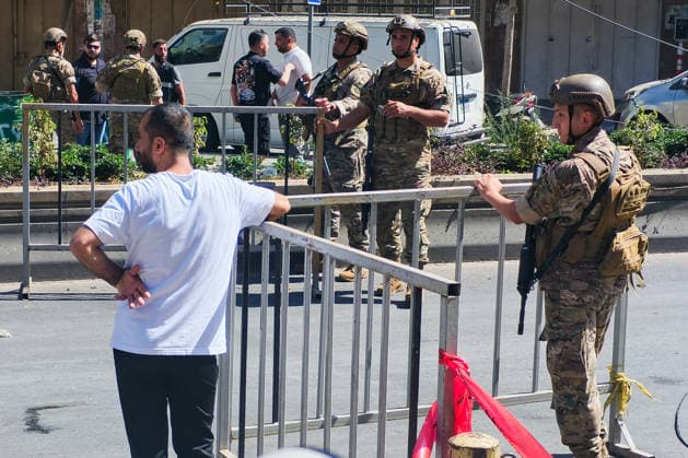 LEBANON, BEIRUT - JUNE 14, 2026: Law enforcement officers guard the area near an apartment building south of Beirut damaged in an airstrike Beirut Lebanon  - ZUMAt113 20260614_zaa_t113_039 Copyright: xAnkharxKochnevax