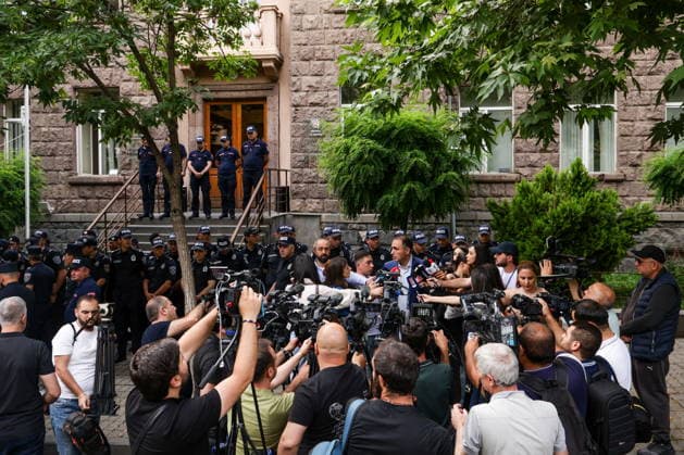 ARMENIA, YEREVAN - JUNE 14, 2026: People gather outside the offices of the Central Electoral Commission of Armenia ahead of the announcement of the results of the 2026 Armenian parliamentary election Yerevan Armenia  - ZUMAt113 20260614_zaa_t113_069 Copyright: xAlexanderxPatrinx