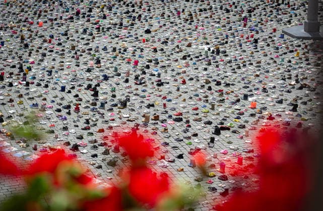Commemoration in Bosch for Palestinian children and journalists killed by Israel BOSCH, NETHERLANDS - JUNE 14: Photographs and names of journalists killed in the Israeli attacks on Gaza, and thousands of children’s shoes are displayed during a commemoration event held for Palestinian children and journalists killed in Israel’s attacks on Gaza in Bosch, Netherlands on June 14, 2026. Organized by the Plant an Olive Tree Foundation in Markt Square in the city center of Den Bosch, the event honored Palestinian children and journalists who lost their lives in Israeli attacks in Gaza. Abdullah Asiran Anadolu Bosch Netherlands. Editorial use only. Please get in touch for any other usage.  Copyright: x2026xAnadoluxAbdullahxAsiranx