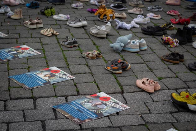 Commemoration in Bosch for Palestinian children and journalists killed by Israel BOSCH, NETHERLANDS - JUNE 14: Photographs and names of journalists killed in the Israeli attacks on Gaza, and thousands of children’s shoes are displayed during a commemoration event held for Palestinian children and journalists killed in Israel’s attacks on Gaza in Bosch, Netherlands on June 14, 2026. Organized by the Plant an Olive Tree Foundation in Markt Square in the city center of Den Bosch, the event honored Palestinian children and journalists who lost their lives in Israeli attacks in Gaza. Abdullah Asiran Anadolu Bosch Netherlands. Editorial use only. Please get in touch for any other usage.  Copyright: x2026xAnadoluxAbdullahxAsiranx