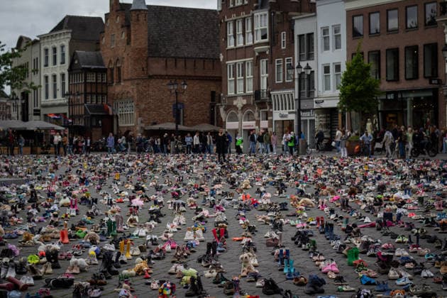 Commemoration in Bosch for Palestinian children and journalists killed by Israel BOSCH, NETHERLANDS - JUNE 14: Photographs and names of journalists killed in the Israeli attacks on Gaza, and thousands of children’s shoes are displayed during a commemoration event held for Palestinian children and journalists killed in Israel’s attacks on Gaza in Bosch, Netherlands on June 14, 2026. Organized by the Plant an Olive Tree Foundation in Markt Square in the city center of Den Bosch, the event honored Palestinian children and journalists who lost their lives in Israeli attacks in Gaza. Abdullah Asiran Anadolu Bosch Netherlands. Editorial use only. Please get in touch for any other usage.  Copyright: x2026xAnadoluxAbdullahxAsiranx