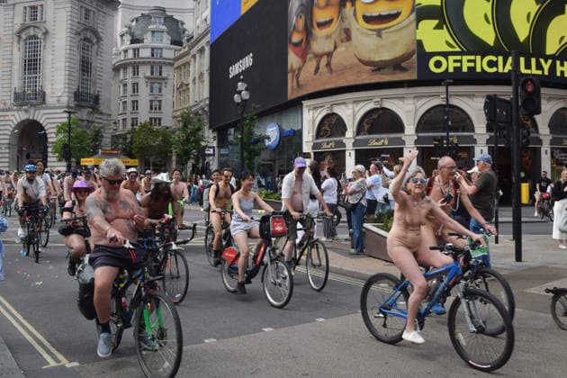 June 14, 2026, London, England, United Kingdom: Nude cyclists pass through Piccadilly Circus during the World Naked Bike Ride. London United Kingdom - ZUMAv130 20260614_zip_v130_022 Copyright: xVukxValcicx