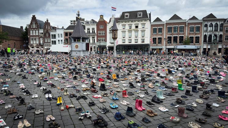 Commemoration in Bosch for Palestinian children and journalists killed by Israel BOSCH, NETHERLANDS - JUNE 14: Photographs and names of journalists killed in the Israeli attacks on Gaza, and thousands of children’s shoes are displayed during a commemoration event held for Palestinian children and journalists killed in Israel’s attacks on Gaza in Bosch, Netherlands on June 14, 2026. Organized by the Plant an Olive Tree Foundation in Markt Square in the city center of Den Bosch, the event honored Palestinian children and journalists who lost their lives in Israeli attacks in Gaza. Abdullah Asiran Anadolu Bosch Netherlands. Editorial use only. Please get in touch for any other usage.  Copyright: x2026xAnadoluxAbdullahxAsiranx