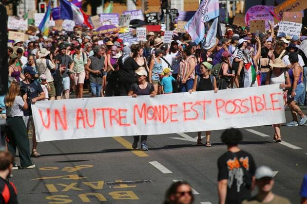 Genf, Schweiz, 14.06.2026: Anti-G7-Protest: Demonstranten protestieren gegen den G7-Gipfel 2026, der im benachbarten Évian-les-Bains, Frankreich, stattfindet. *** Geneva, Switzerland, 14 06 2026 Anti G7 protest Demonstrators protest against the G7 Summit 2026 taking place in neighboring Évian les Bains, France Copyright: xdtsxNachrichtenagenturx dts_122930