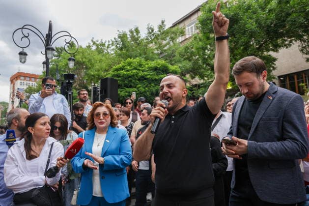 ARMENIA, YEREVAN - JUNE 14, 2026: People are seen outside the offices of the Central Electoral Commission of Armenia during the announcement of the results of the 2026 Armenian parliamentary election Yerevan Armenia  - ZUMAt113 20260614_zaa_t113_111 Copyright: xAlexanderxPatrinx