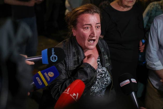 ARMENIA, YEREVAN - JUNE 14, 2026: A woman talks to journalists outside the offices of the Central Electoral Commission of Armenia during the announcement of the results of the 2026 Armenian parliamentary election Yerevan Armenia  - ZUMAt113 20260614_zaa_t113_162 Copyright: xAlexanderxPatrinx