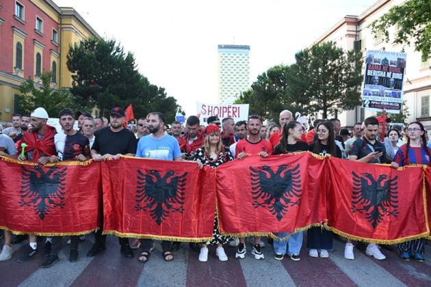 Protests against Zvernec tourism project in Albania continue on 15th day TIRANA, ALBANIA - JUNE 14: Protesters carrying Albanian flags march towards the Prime Ministry building along the Nation s Martyrs Boulevard (Bulevardi Deshmoret e Kombit) during a demonstration against a luxury tourism project in Zvernec linked to Ivanka Trump and Jared Kushner, on the 15th day of protests in Tirana, Albania on June 14, 2026. Olsi Shehu Anadolu Tirana Albania. Editorial use only. Please get in touch for any other usage.  Copyright: x2026xAnadoluxOlsixShehux