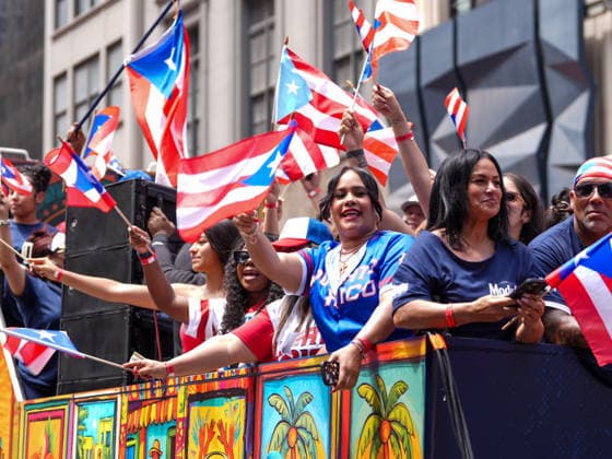 New York, NY June 14: Participants march in the annual National Puerto Rican Day Parade along Fifth Avenue in Manhattan celebrating Puerto Rican culture, heritage, and contributions to New York City on June 14, 2026. Credit: Xavier Diaz . USA - ZUMAa123 20260614_zaa_a123_028 Copyright: xAdMediax