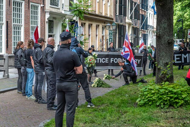 June 14, 2026, Den Haag, South Holland, Netherlands: Den Haag, 14 June 2026. Around 50 far-right demonstrators gathered on Burgemeester Patijnlaan for a memorial march for Henry Nowak (18, British Polish university student). Nowak was killed on 3 December 2025 by Vickrum Singh Digwa in Southampton, England. The march ended at the Embassy of Great Britain, where demonstrators laid a wreath and flowers, and held banners saying Ã¢â‚¬oeJustice for HenryÃ¢â‚¬Â and Ã¢â‚¬oeWhite Lives MatterÃ¢ Den Haag Netherlands - ZUMAp202 20260614_zip_p202_008 Copyright: xJamesxPetermeierx