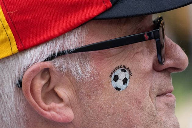 June 14, 2026, Frankfurt, Hesse, Germany: A German fan watches the live broadcast of the FIFA World Cup match between Germany and Curacao in Frankfurt am Main, Germany. Frankfurt Germany - ZUMAb332 20260614_zip_b332_011 Copyright: xMatiasxBasualdox