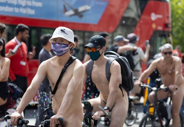 June 14, 2026, London, England, United Kingdom: Naked cyclists ride through Westminster during the annual World Naked Bike Ride, demanding greater respect for cyclists and protesting air pollution. London United Kingdom  - ZUMAs262 20260614_zip_s262_018 Copyright: xTayfunxSalcix