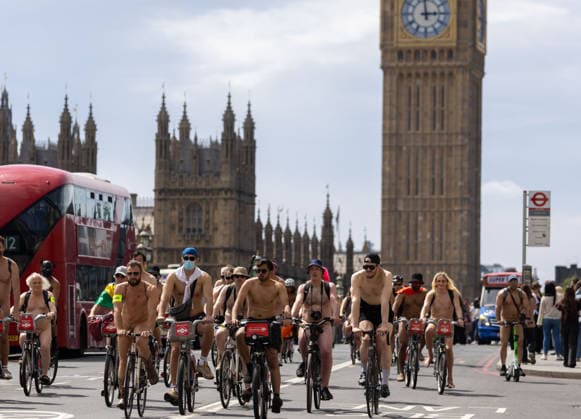 June 14, 2026, London, England, United Kingdom: Naked cyclists ride through Westminster during the annual World Naked Bike Ride, demanding greater respect for cyclists and protesting air pollution. London United Kingdom  - ZUMAs262 20260614_zip_s262_020 Copyright: xTayfunxSalcix