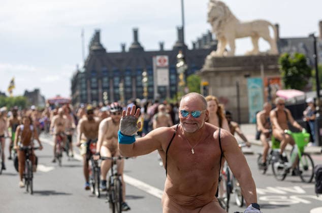 June 14, 2026, London, England, United Kingdom: Naked cyclists ride through Westminster during the annual World Naked Bike Ride, demanding greater respect for cyclists and protesting air pollution. London United Kingdom  - ZUMAs262 20260614_zip_s262_028 Copyright: xTayfunxSalcix