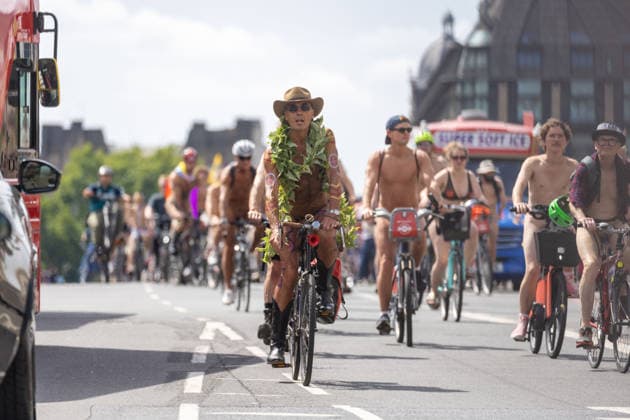 June 14, 2026, London, England, United Kingdom: Naked cyclists ride through Westminster during the annual World Naked Bike Ride, demanding greater respect for cyclists and protesting air pollution. London United Kingdom - ZUMAs262 20260614_zip_s262_026 Copyright: xTayfunxSalcix