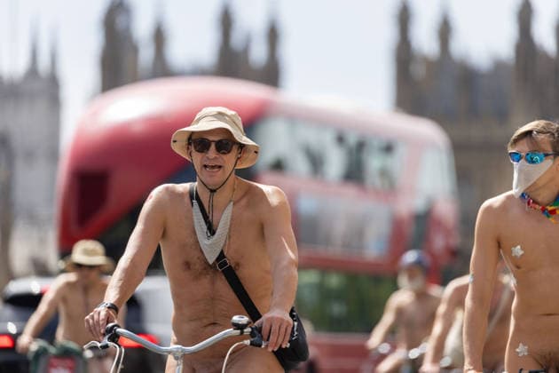 June 14, 2026, London, England, United Kingdom: Naked cyclists ride through Westminster during the annual World Naked Bike Ride, demanding greater respect for cyclists and protesting air pollution. London United Kingdom  - ZUMAs262 20260614_zip_s262_045 Copyright: xTayfunxSalcix