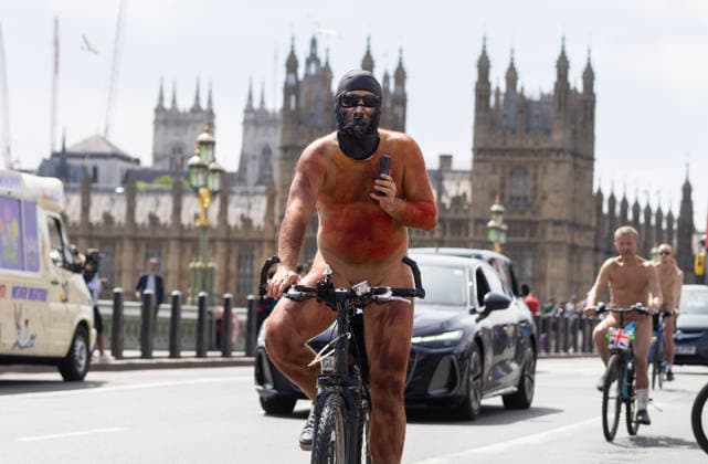 June 14, 2026, London, England, United Kingdom: Naked cyclists ride through Westminster during the annual World Naked Bike Ride, demanding greater respect for cyclists and protesting air pollution. London United Kingdom  - ZUMAs262 20260614_zip_s262_049 Copyright: xTayfunxSalcix
