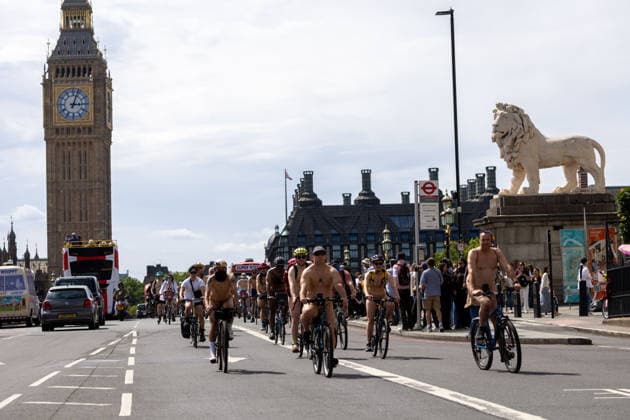 June 14, 2026, London, England, United Kingdom: Naked cyclists ride through Westminster during the annual World Naked Bike Ride, demanding greater respect for cyclists and protesting air pollution. London United Kingdom - ZUMAs262 20260614_zip_s262_034 Copyright: xTayfunxSalcix