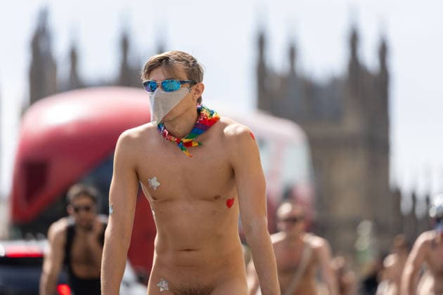 June 14, 2026, London, England, United Kingdom: Naked cyclists ride through Westminster during the annual World Naked Bike Ride, demanding greater respect for cyclists and protesting air pollution. London United Kingdom - ZUMAs262 20260614_zip_s262_046 Copyright: xTayfunxSalcix