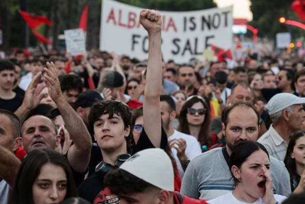 Day 15 Anti-Kushner Resort Protest in Albania TIRANA, ALBANIA JUNE 14, 2026: Environmental activists, civil society groups, families, members of the Albanian diaspora and young people take part in the fifteenth consecutive day of protests against a proposed luxury tourism development project linked to Jared Kushner. Demonstrators gathered outside the Prime Minister™s Office before marching through central Tirana and along major roads across the capital, eventually reaching and temporarily blocking the Tirana DurrÃ«s highway. Protesters carried banners, placards and Albanian flags while calling for the cancellation of the project, citing concerns over environmental protection and public access to coastal areas. The protest movement h