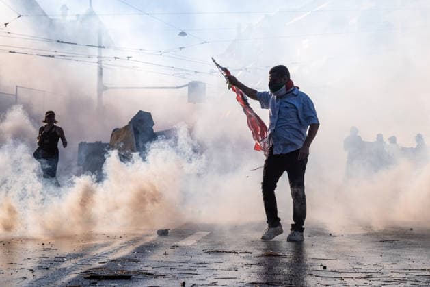 June 14, 2026, Geneva, Canton Of Geneva, Switzerland: Thousands of people took part in the NOG7 demonstration held in Geneva on 14 June. During the protest, shop windows were smashed and a car was set alight, and demonstrators clashed repeatedly with the police. The march, which set off from the lakeside, then made its way through the city centre, passing in front of the UNHCR headquarters, where clashes broke out. Geneva Switzerland - ZUMAs377 20260614_znp_s377_055 Copyright: xPietroxStariccox