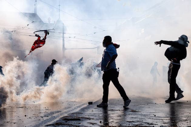 June 14, 2026, Geneva, Canton Of Geneva, Switzerland: Thousands of people took part in the NOG7 demonstration held in Geneva on 14 June. During the protest, shop windows were smashed and a car was set alight, and demonstrators clashed repeatedly with the police. The march, which set off from the lakeside, then made its way through the city centre, passing in front of the UNHCR headquarters, where clashes broke out. Geneva Switzerland - ZUMAs377 20260614_znp_s377_057 Copyright: xPietroxStariccox
