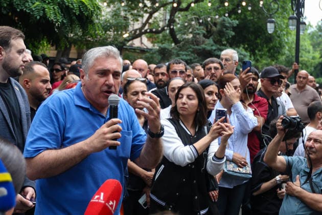 June 14, 2026, Yerevan, Armenia: Armenian National Assembly member Artur Khachatryan speaks to crowd of protestors during the rally. Armenia™s Central Election Commission (CEC) has certified the results of the June 7 parliamentary elections, confirming that Prime Minister Nikol Pashinyan™s Civil Contract party secured 49.74% of the vote, enough to form a government independently without coalition partners. The Prosperous Armenia party, led by billionaire Gagik Tsarukyan, narrowly failed to clear the 4% parliamentary threshold and called on its supporters to gather outside the CEC building in protest. Opposition, rejecting the outcome as illegitimate, addressed crowds demanding a rerun of the vote. Yerevan Armenia - ZUMAs197 20260614_aaa_s197_226 Copyright: xYanxKhachkox