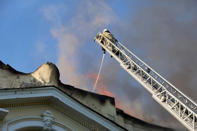 Rescuers use an aerial ladder to extinguish a fire at the Kharkiv Art Museum, caused by a Russian drone strike, Kharkiv, Ukraine, June 14, 2026. The Russian army attacked the northeastern city with drones, injuring five people, including a one-month-old baby. On the afternoon of June 14, Russians struck two districts of Kharkiv with drones. (Photo by Viacheslav Madiievskyi Ukrinform) Russians strike Kharkiv Art Museum with drone  Copyright: xViacheslavxMadiievskyix