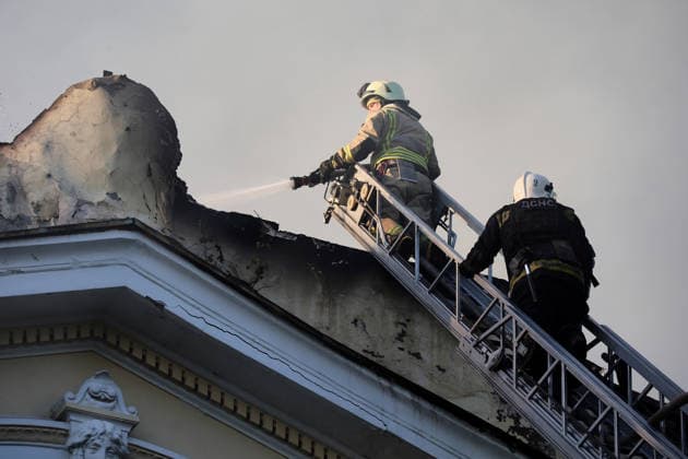 Rescuers use an aerial ladder to extinguish a fire at the Kharkiv Art Museum, caused by a Russian drone strike, Kharkiv, Ukraine, June 14, 2026. The Russian army attacked the northeastern city with drones, injuring five people, including a one-month-old baby. On the afternoon of June 14, Russians struck two districts of Kharkiv with drones. (Photo by Viacheslav Madiievskyi Ukrinform) Russians strike Kharkiv Art Museum with drone  Copyright: xViacheslavxMadiievskyix