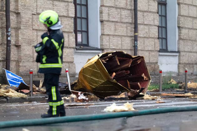 A firefighter stands in the street near a dome brought down by a massive Russian combined attack, Kyiv, Ukraine, June 15, 2026. The Russian army launched a large-scale assault on the Ukrainian capital with missiles and strike drones, killing four people and injuring 28, including children and a pregnant woman. At least 140,000 consumers were left without electricity due to damage to power grids. Residential buildings, the Kyiv Pechersk Lavra, the Mystetskyi Arsenal Museum Complex, the Dovzhenko Film Studio, and the building of the High Anti-Corruption Court sustained damage. (Photo by Kyrylo Chubotin Ukrinform) Massive Russian attack damages Kyiv Pechersk Lavra and Mystetskyi Arsenal in Kyiv  Copyright: xKirillxChubotinx