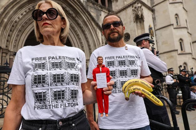 June 15, 2026, London, London, UK: London, UK. Supporters of Palestine Action during a protest outside the Royal Courts of Justice in London ahead of the court s judgment on the government s appeal over the proscription of Palestine Action under terrorism laws. London UK  - ZUMAl94_ 20260615_zaf_l94_045 Copyright: xDinendraxHariax