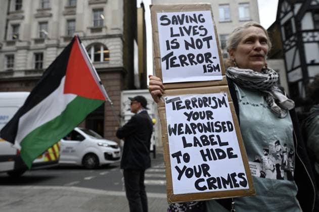 UK Court of Appeal upholds ban on Palestine Action LONDON, UNITED KINGDOM - JUNE 15: Demonstrators, holding banners and placards, gather outside the Royal Courts of Justice during a Lift The Ban protest organized by Defend Our Juries, following a Court of Appeal ruling that upheld the legality of the ban on Palestine Action, a group known for targeting companies linked to Israel, in London, United Kingdom, on June 15, 2026. Rasid Necati Aslim Anadolu London United Kingdom. Editorial use only. Please get in touch for any other usage.  Copyright: x2026xAnadoluxRaÅüidxNecatixAslÄ±mx