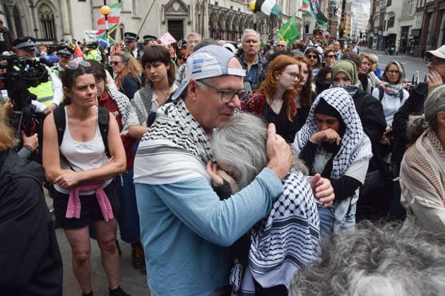 June 15, 2026, London, England, United Kingdom: Protesters react outside the Royal Courts of Justice as the ban on the activist group Palestine Action is ruled as lawful by the Court of Appeal. Judges have overturned a previous ruling that the ban on the group was wrong. London United Kingdom  - ZUMAv130 20260615_zip_v130_001 Copyright: xVukxValcicx