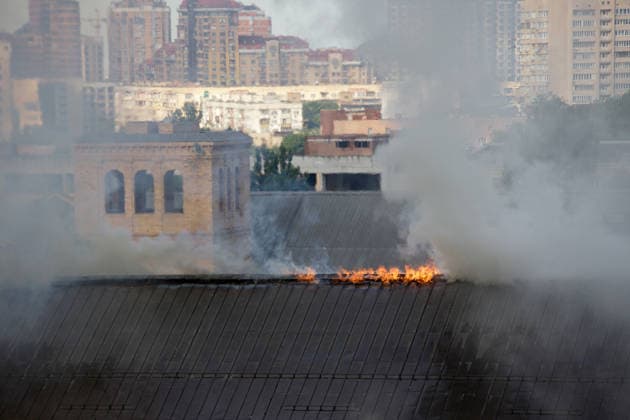 Massive Russian attack damages Kyiv Pechersk Lavra and Mystetskyi Arsenal in Kyiv Flames are seen on the roof of the Mystetskyi Arsenal National Cultural, Art and Museum Complex, damaged by a massive Russian combined attack, Kyiv, Ukraine, June 15, 2026. The Russian army launched a large-scale assault on the Ukrainian capital with missiles and strike drones, killing four people and injuring 28, including children and a pregnant woman. At least 140,000 consumers were left without electricity due to damage to power grids. Residential buildings, the Kyiv Pechersk Lavra, the Mystetskyi Arsenal Museum Complex, the Dovzhenko Film Studio, and the building of the High Anti-Corruption Court sustained damage., Credit:Marianna Kotyk Ukrinform Aval  Copyright: xMariannaxKotykx xUkrinformx xAvalonx 1110345003