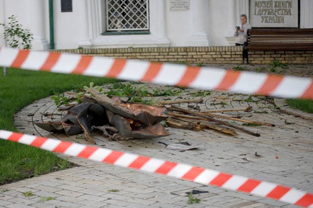 Massive Russian attack damages Kyiv Pechersk Lavra and Mystetskyi Arsenal in Kyiv Debris lies on the ground behind barricade tape at the Kyiv Pechersk Lavra, where the roof of the Dormition Cathedral caught fire during a massive Russian combined attack, Kyiv, Ukraine, June 15, 2026. The Russian army launched a large-scale assault on the Ukrainian capital with missiles and strike drones, killing four people and injuring 28, including children and a pregnant woman. At least 140,000 consumers were left without electricity due to damage to power grids. Residential buildings, the Kyiv Pechersk Lavra, the Mystetskyi Arsenal Museum Complex, the Dovzhenko Film Studio, and the building of the High Anti-Corruption Court sustained damage., Credit:Mari  Copyright: xMariannaxKotykx xUkrinformx xAvalonx 1110345034