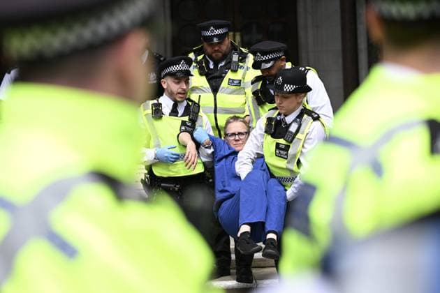UK Court of appeal s Palestine Action decision protested in London LONDON, UK - JUNE 15: Metropolitan Police officers detain a pro-Palestine demonstrator outside the Royal Courts of Justice in London, United Kingdom on June 15, 2026. A protest was staged following the UK Court of Appeal s decision to uphold the government s ruling to designate the activist group Palestine Action as a terrorist organization, leading to police intervention and multiple arrests. Rasid Necati Aslim Anadolu London United Kingdom. Editorial use only. Please get in touch for any other usage.  Copyright: x2026xAnadoluxRasidxNecatixAslimx