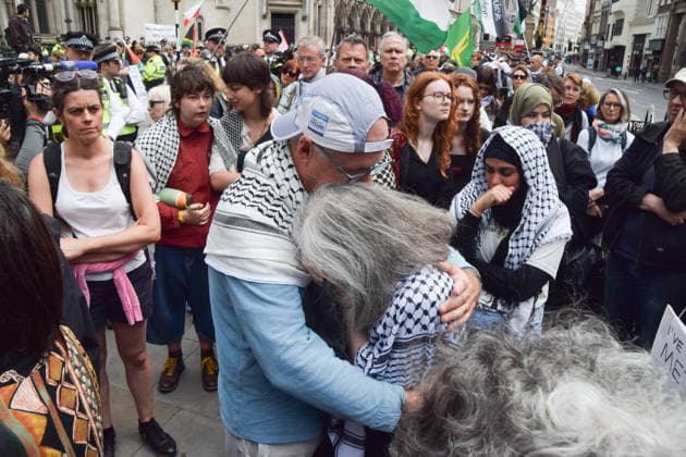 June 15, 2026, London, England, United Kingdom: Protesters react outside the Royal Courts of Justice as the ban on the activist group Palestine Action is ruled as lawful by the Court of Appeal. Judges have overturned a previous ruling that the ban on the group was wrong. London United Kingdom - ZUMAv130 20260615_zip_v130_003 Copyright: xVukxValcicx