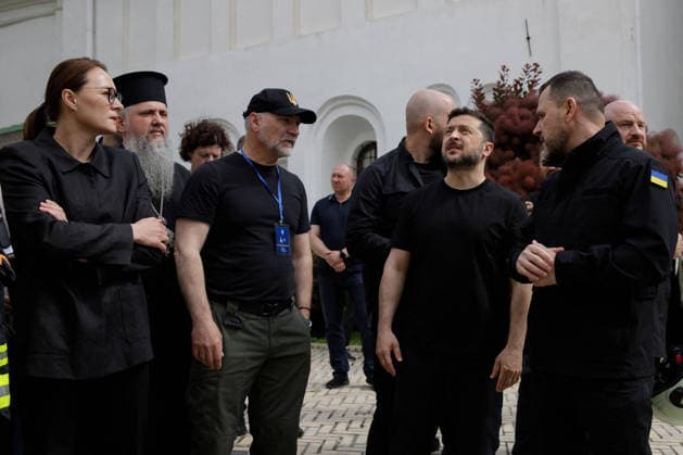Ukrainian Leaders Visit Kyiv Pechersk Lavra After Russian Attack - Kyiv Prime Minister of Ukraine Yuliia Svyrydenko, Metropolitan of Kyiv and All Ukraine, Primate of the Orthodox Church of Ukraine Epiphanius, Director General of the Kyiv Pechersk Lavra National Preserve Maksym Ostapenko, President of Ukraine Volodymyr Zelenskyy and Minister of Internal Affairs of Ukraine Ihor Klymenko (L to R) visit the Kyiv Pechersk Lavra, where the roof of the Dormition Cathedral caught fire during a massive Russian combined attack, Kyiv, Ukraine, June 15, 2026. The Russian army launched a large-scale assault on the Ukrainian capital with missiles and strike drones, killing four people and injuring 28, including children and a pregnant woman. At least 140  Copyright: xUkrinform ABACAx