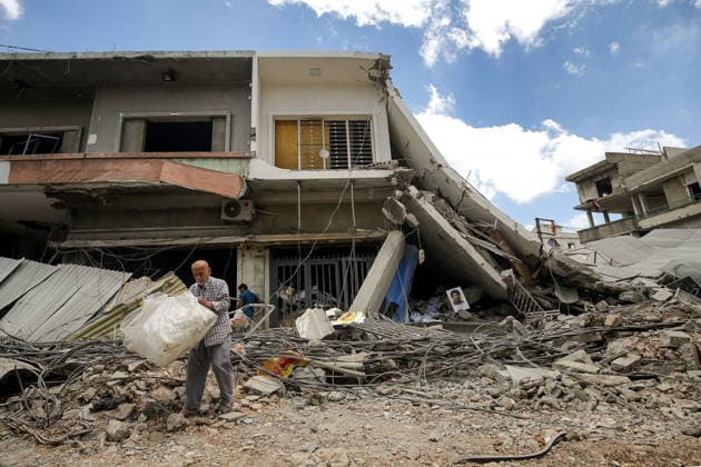 June 15, 2026, Nabatieh, Nabatieh, Lebanon: Lebanese Sayed Khalaf salavges material from his devastated shop in the southern Lebanese city of Nabatieh. Scores of families started to return to their villages following the announcement of an initial ceasefire agreement between the United States and Iran. Nabatieh Lebanon - ZUMAn313 20260615_zip_n313_007 Copyright: xMarwanxNaamanix