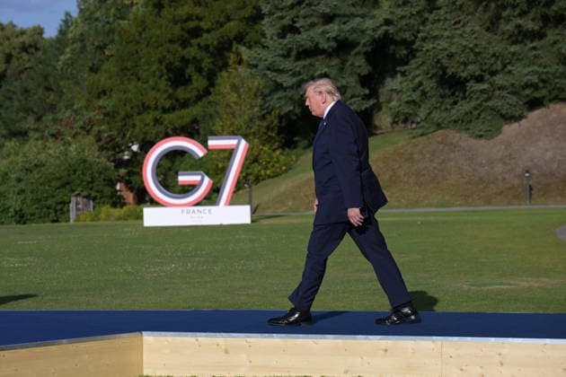 RECORD DATE NOT STATED G7 Summit - Welcoming Ceremony By President Macron And Wife U.S. President Donald Trump at the official welcoming ceremony hosted by French President Emmanuel Macron (not pictured) and his wife First Lady of France, Brigitte Macron (not pictured) during G7 Summit at the Hotel Royal in Evian-les-Bains, France on June 15, 2026. A G7 summit is set to take place June 15 to 17 in the French town of Evian-les-Bains near Switzerland and it will be attended by country leaders as well as the EU s foreign policy chief and ministers from Brazil, Canada, the United Arab Emirates and Turkey. Photo by Ammar Abd Rabbo ABACAPRESS.COM Evian-les-Bains France  Copyright: xAbdxRabboxAmmar ABACAx