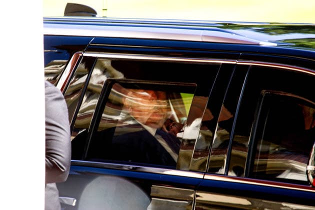 June 15, 2026, Evian-Les-Bains, Haute-Savoie, France: EVIAN-LES-BAINS, FRANCE - JUNE 15, 2026: U.S. President Donald Trump is seen through the bulletproof glass window of his armored presidential vehicle upon arriving at the HoÂ tel Royal. Tight security measures are in place at the luxury resort in o°vian-les-Bains for the arrival of the American President, who is scheduled to attend high-level diplomatic meetings. Evian-Les-Bains France - ZUMAc267 20260615_zip_c267_001 Copyright: xMarcoxCordonex
