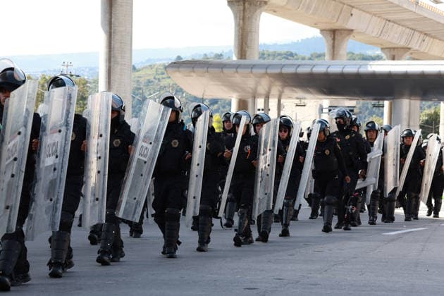 CNTE teachers protest in Mexico City on 15th day of strike MEXICO CITY, MEXICO - JUNE 15: Riot police stand guard during a protest by CNTE teachers at a toll booth in southern Mexico City, Mexico on June 15, 2026. Members of National Coordination of Education Workers (CNTE) staged protests at multiple toll booths, allowing motorists to pass without paying as their national strike reached its 15th day. Daniel Cardenas Anadolu Mexico City Mexico. Editorial use only. Please get in touch for any other usage.  Copyright: x2026xAnadoluxDanielxCardenasx