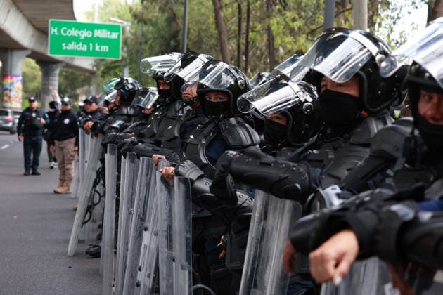 CNTE teachers protest in Mexico City on 15th day of strike MEXICO CITY, MEXICO - JUNE 15: Riot police stand guard during a protest by CNTE teachers at a toll booth in southern Mexico City, Mexico on June 15, 2026. Members of National Coordination of Education Workers (CNTE) staged protests at multiple toll booths, allowing motorists to pass without paying as their national strike reached its 15th day. Daniel Cardenas Anadolu Mexico City Mexico. Editorial use only. Please get in touch for any other usage.  Copyright: x2026xAnadoluxDanielxCardenasx