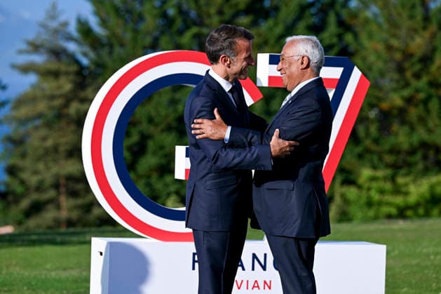 France s President Emmanuel Macron (L) greets European Council President Antonio Costa during the G7 summit, in Evian, eastern France, on Monday, June 15, 2026. The G7 Summit, scheduled from June 15 to 17 in Évian-les-Bains near the Swiss border, brings together heads of state along with the EU foreign policy chief and ministers from Brazil, Canada, the United Arab Emirates, and Turkey.  FRN2026061504 EuropeanxUnion