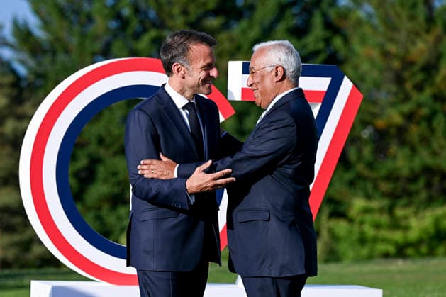 France s President Emmanuel Macron (L) greets European Council President Antonio Costa during the G7 summit, in Evian, eastern France, on Monday, June 15, 2026. The G7 Summit, scheduled from June 15 to 17 in Évian-les-Bains near the Swiss border, brings together heads of state along with the EU foreign policy chief and ministers from Brazil, Canada, the United Arab Emirates, and Turkey.  FRN2026061507 EuropeanxUnion