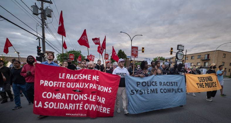 June 15, 2026, Montreal, Pq, Canada: Anti police brutality protesters march outside Montreal police station 39 in Montreal North during an anti police brutality protest on Monday June 15, 2026. Montreal Canada  - ZUMAc35_ 20260615_zaf_c35_133 Copyright: xPeterxMccabex