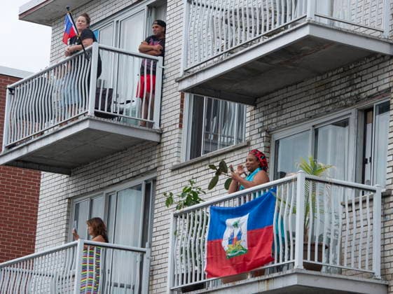 June 15, 2026, Montreal, Pq, Canada: Onlookers applaud Anti police brutality protesters as they march from Montreal police station 39 in Montreal North during an anti police brutality protest on Monday June 15, 2026. Montreal Canada  - ZUMAc35_ 20260615_zaf_c35_136 Copyright: xPeterxMccabex